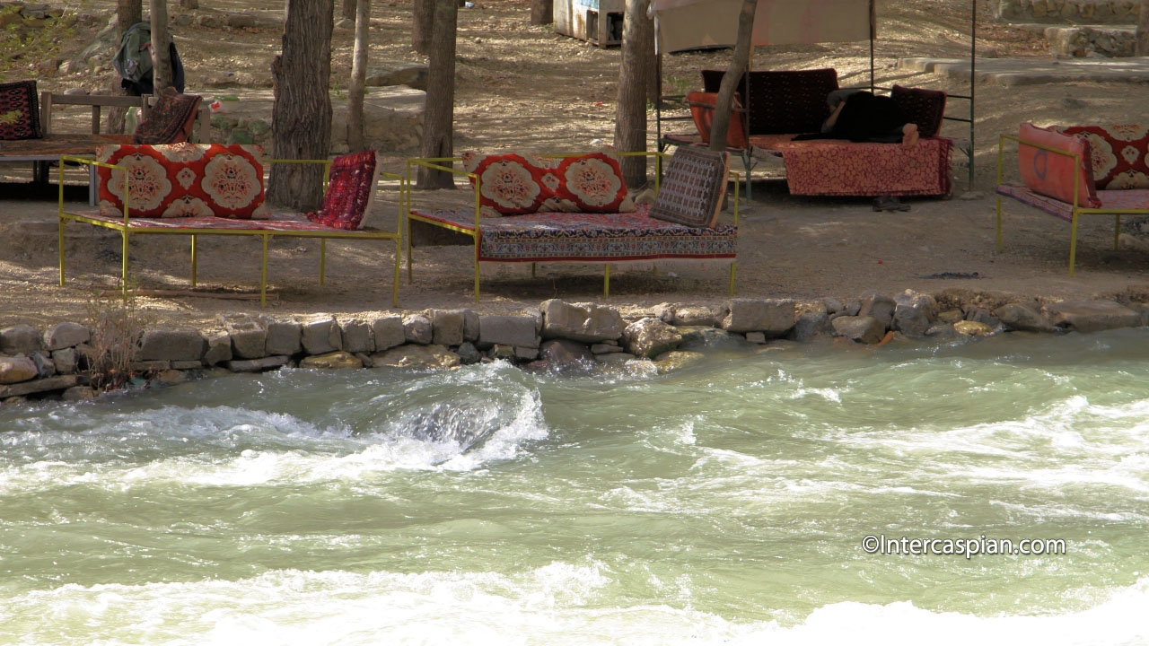 Carpeted sitting platforms alongside Chalus river